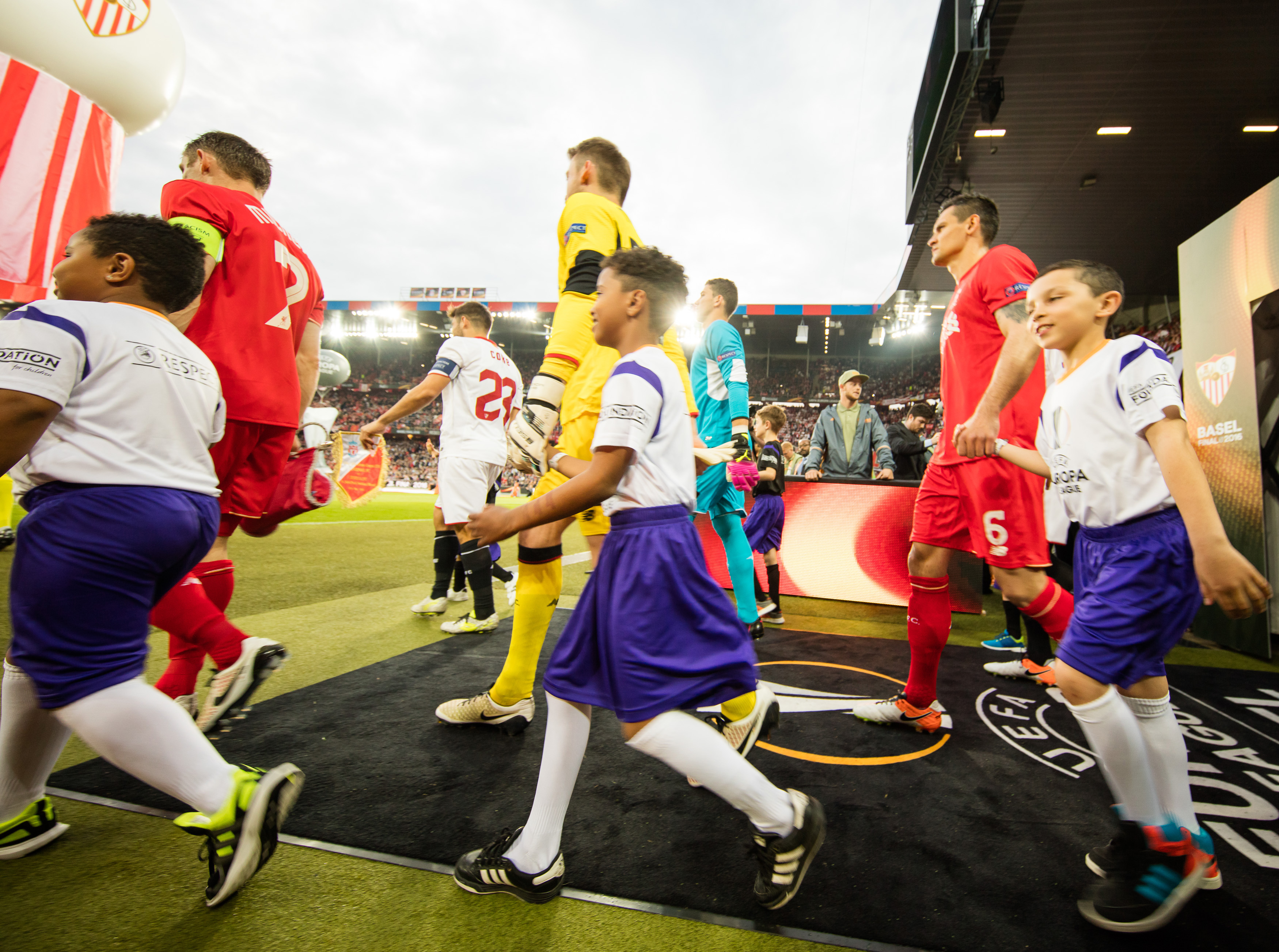 BASEL, SWITZERLAND - MAY 18:  Fedex player escort kids are seen prior to the UEFA Europa League Final between Liverpool and Sevilla at St. Jakob-Park on May 18, 2016 in Basel, Switzerland.  (Photo by Simon Hofmann - UEFA/UEFA via Getty Images)